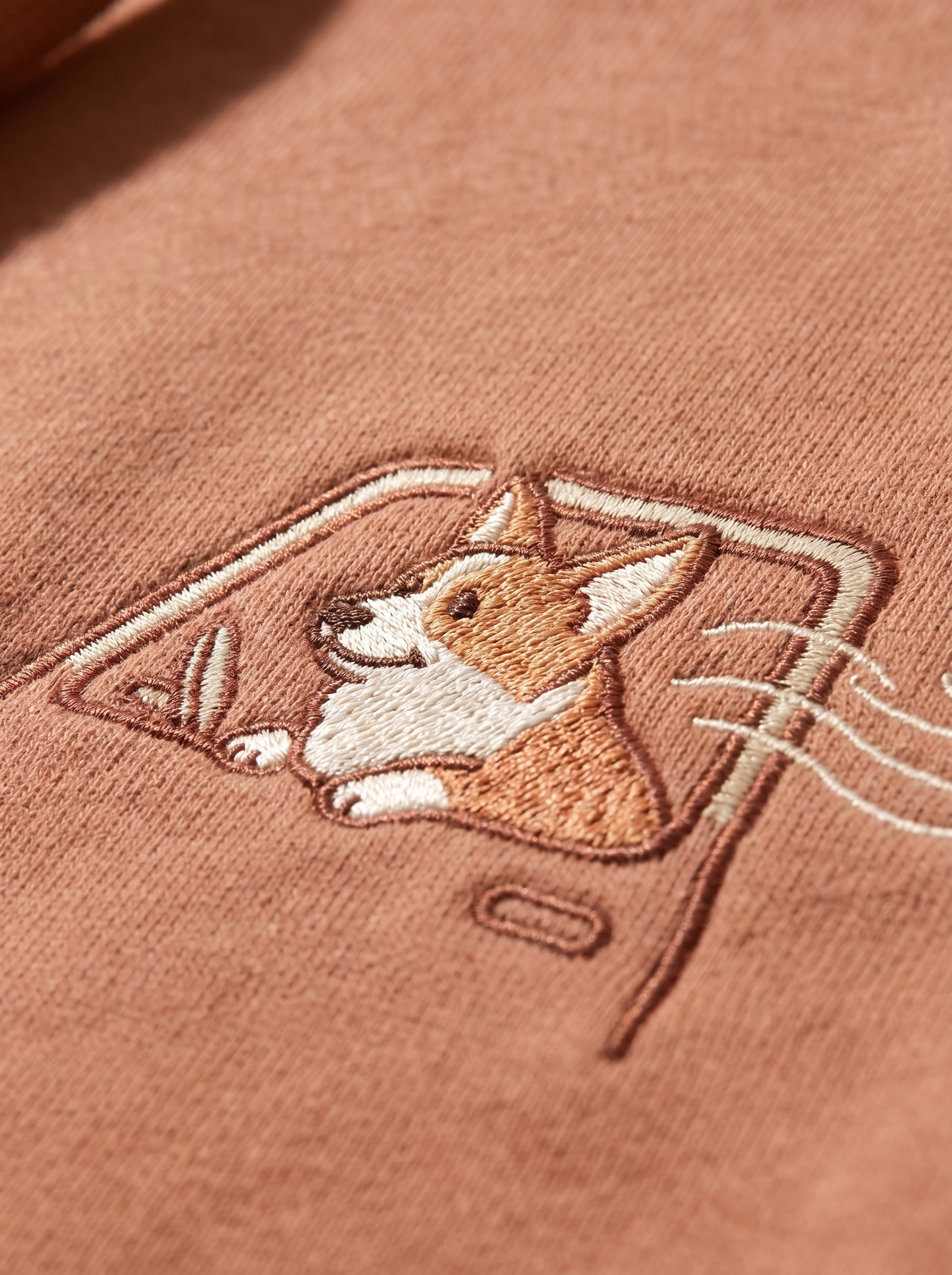 embroidered roadtrip corgi hoodie - embroidery macro detail