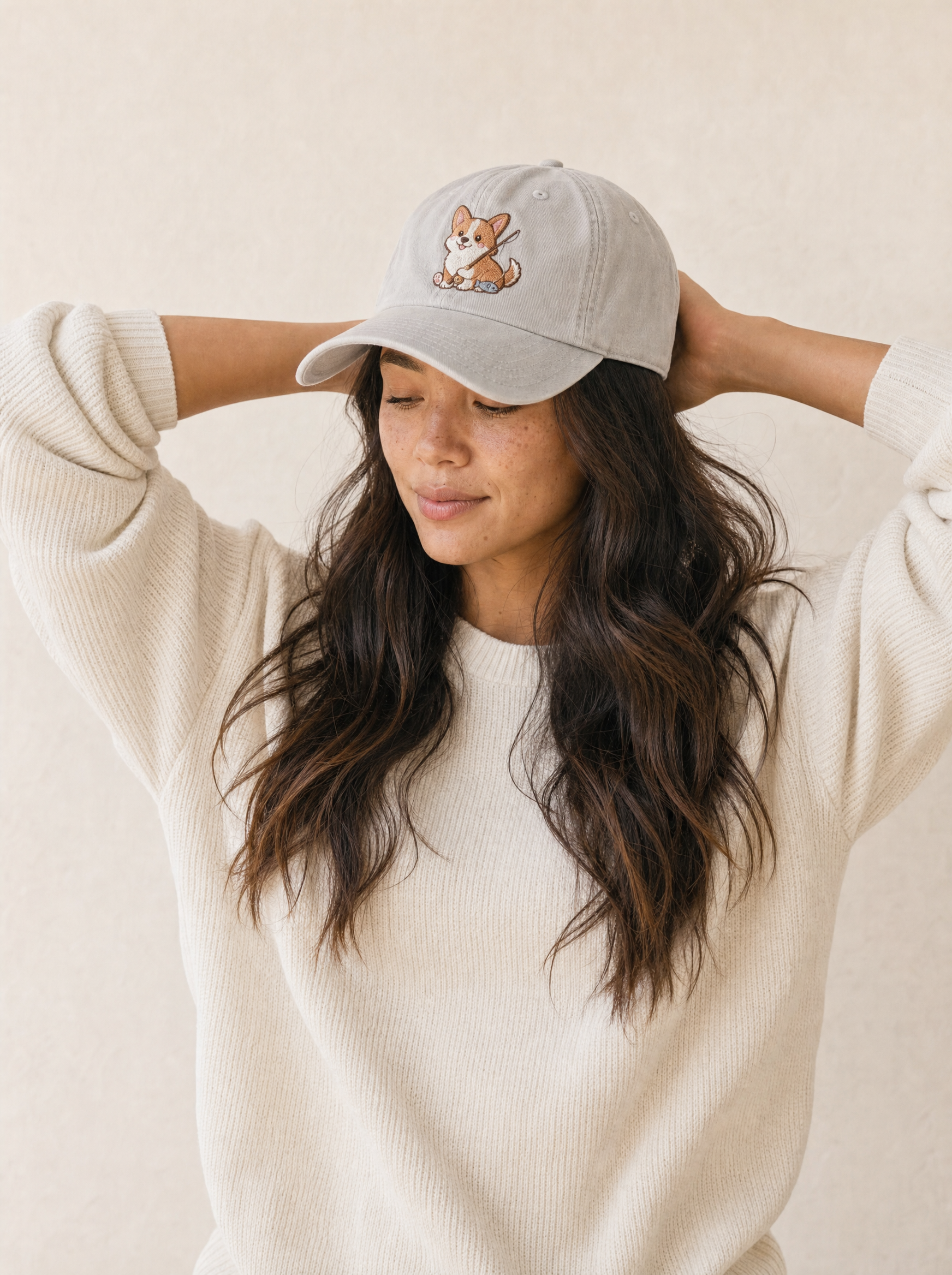 embroidered fishing pier corgi hat - model upper body