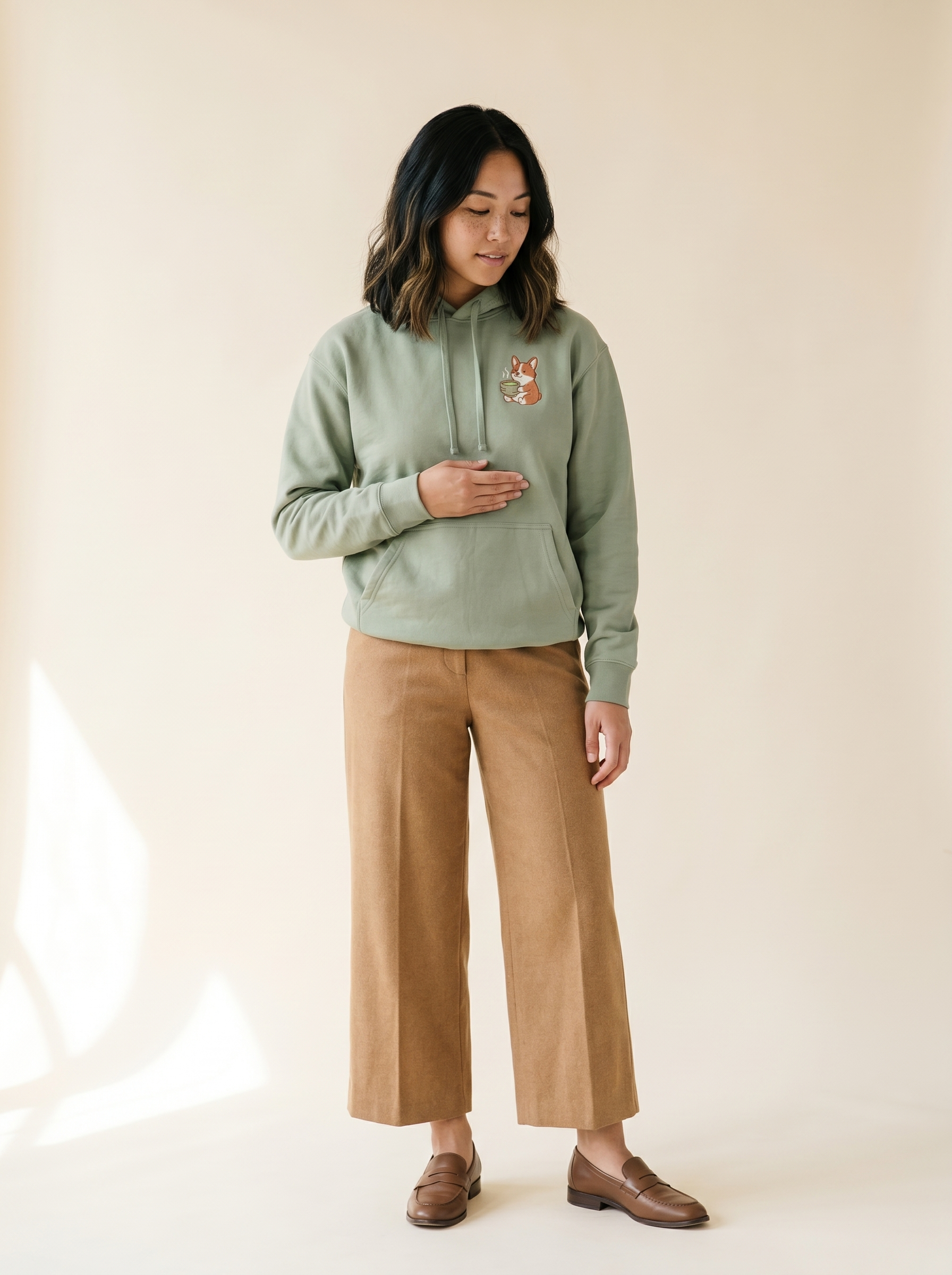 embroidered matcha latte corgi hoodie - model standing