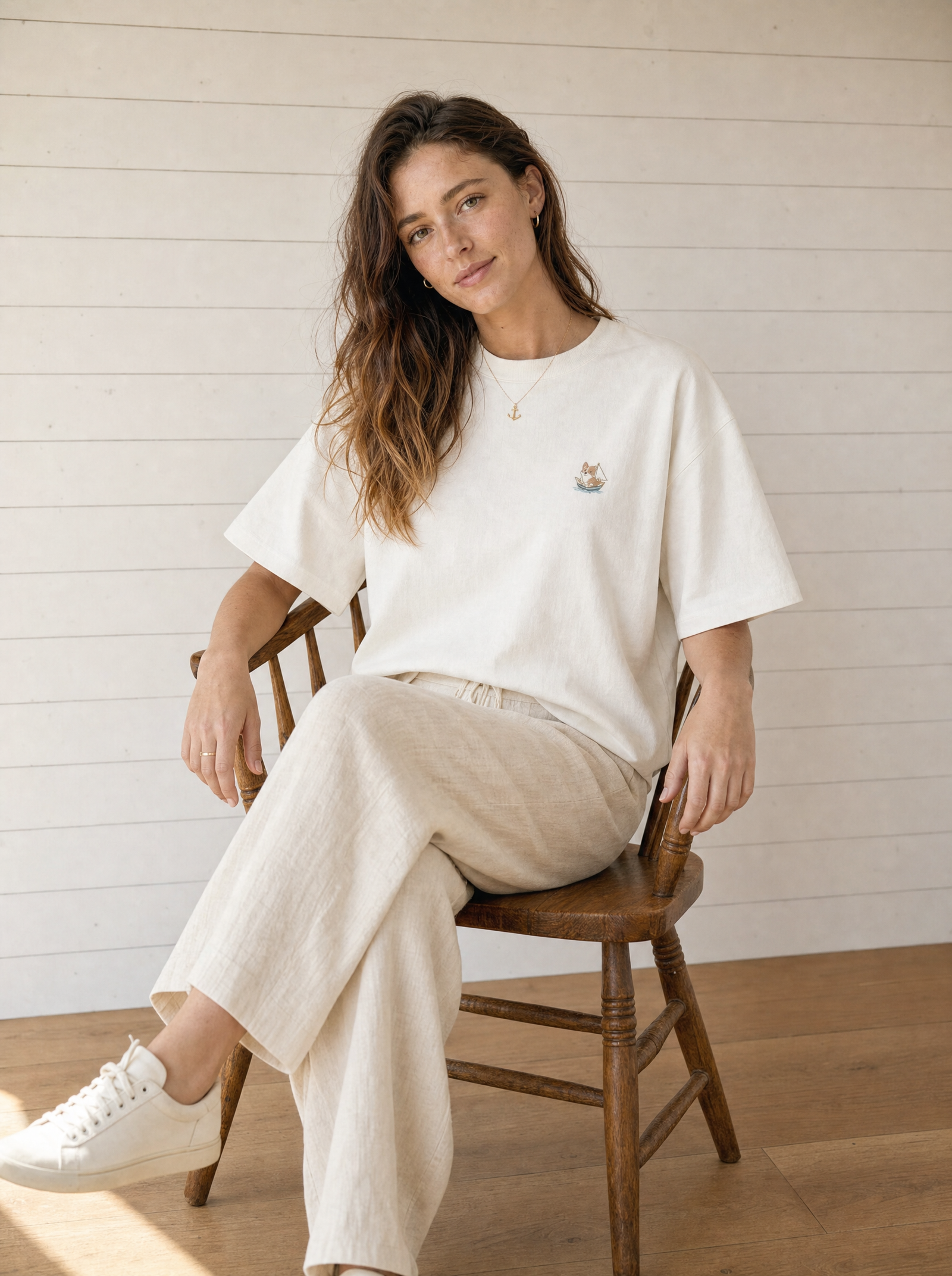 embroidered sailing corgi t-shirt - model seated